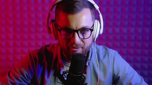 Blogger or Radio DJ Recording in Studio