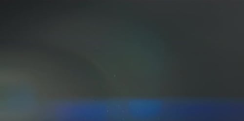 Anamorphic Dust Particles