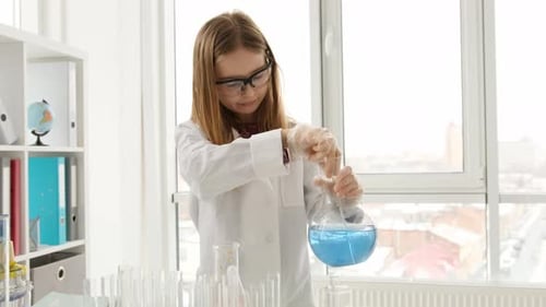 School Girl in Chemistry Class