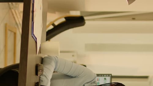 Vertical Video Portrait of Businesswoman Using Computer at Company Desk
