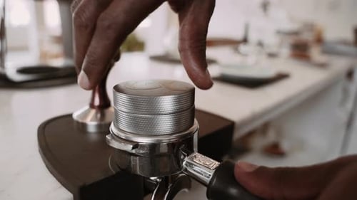 Coffee brewing process at a cafe