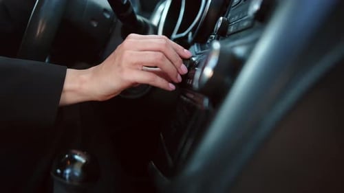 Woman Driving Car and Listening to Music on Auto Audio System Slow Motion
