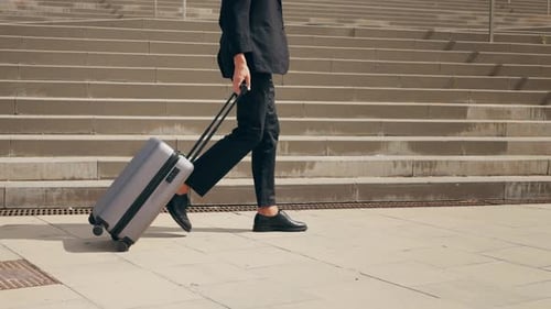 Tourist Man with Suitcase Baggage in Spain A Traveler with Luggage Suit Jacket on Business Street Go