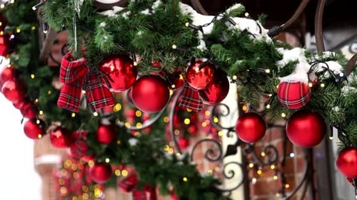 Festive Christmas Decorations on City Building in Winter