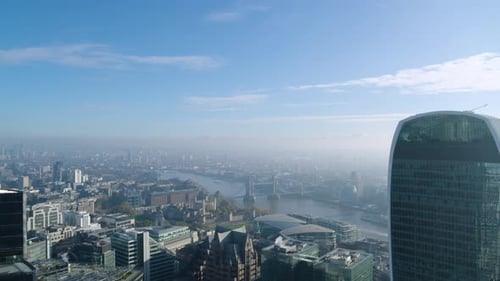 Aerial of the London Skyline featuring the Tower of London, Thames river and Tower Bridge and the Wa