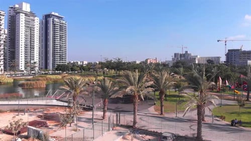 Lake Palm Trees And Modern Buildings aerial View