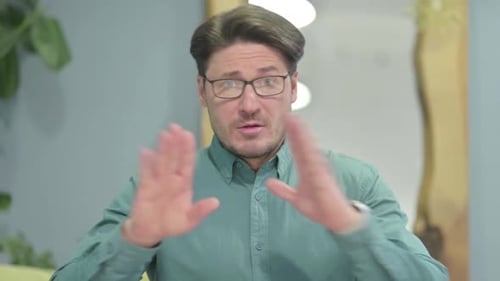 Portrait of Disliking Middle Aged Man Feeling Displeased