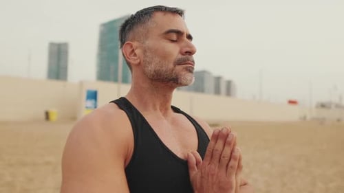 Close up, mature man doing breathing exercises