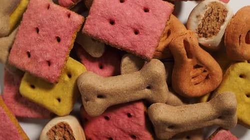 Rotating Dog Treats. Treats for dogs on a white background. Dog food close up.