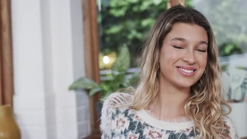 Smiling Woman in White Sweater Close Up