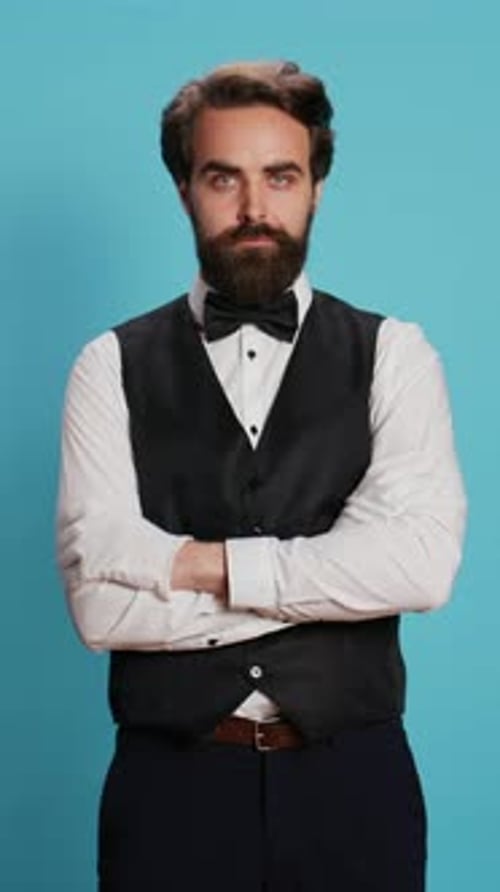 Vertical Video Hotel Concierge Poses with Gloves