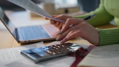 Office Hand Holding Pen Examining Contract Closeup Accountant Counting Coasts