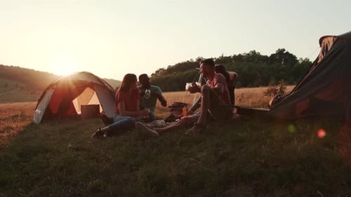 Group of Friends Camping at Sunset