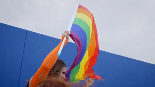 Group Celebrates Pride With Rainbow Flag