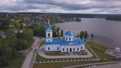 Top view of monastery by river bank