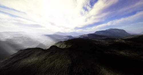 Atmospheric 3D Mountain Landscape Flyover with Dynamic Clouds