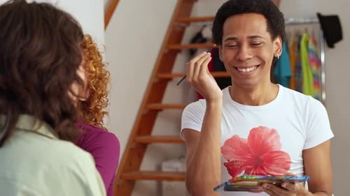 Friends Applying Makeup Together at Home, Smiling