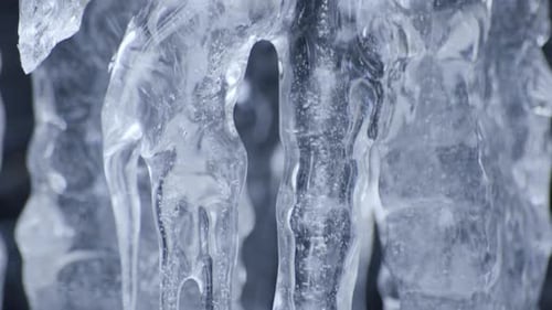 shot of icicles. Smooth tilt movement downwards.