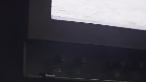 Analog Television Screen Displaying White Noise Static