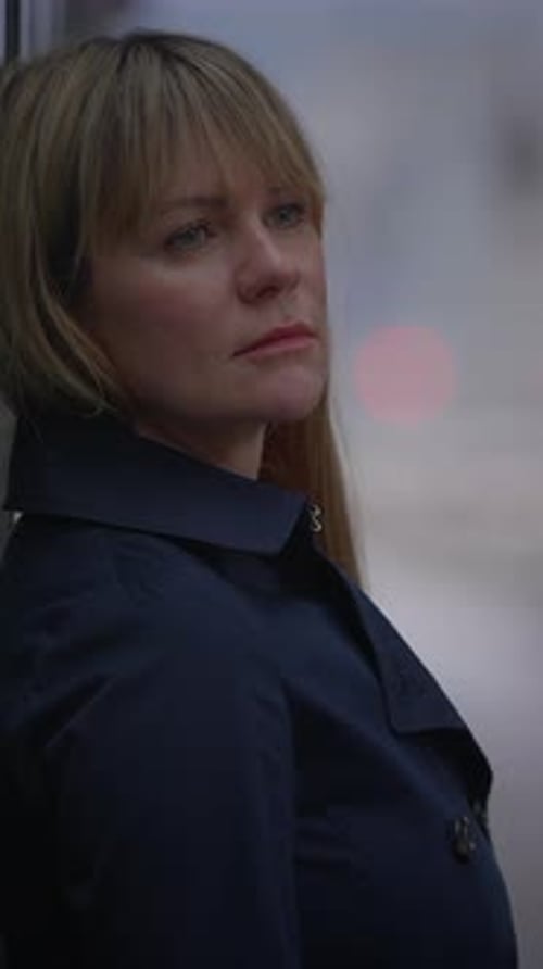 Adult Woman Leaning Against a Wall Outside