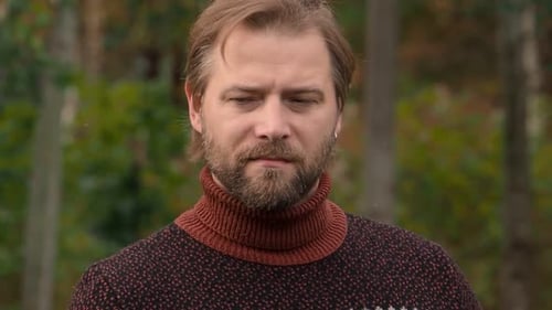 Blond Man in Turtleneck Sweater Posing Outdoors