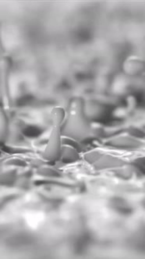 Slow Motion Liquid Splash Grayscale Abstract Vertical Loop