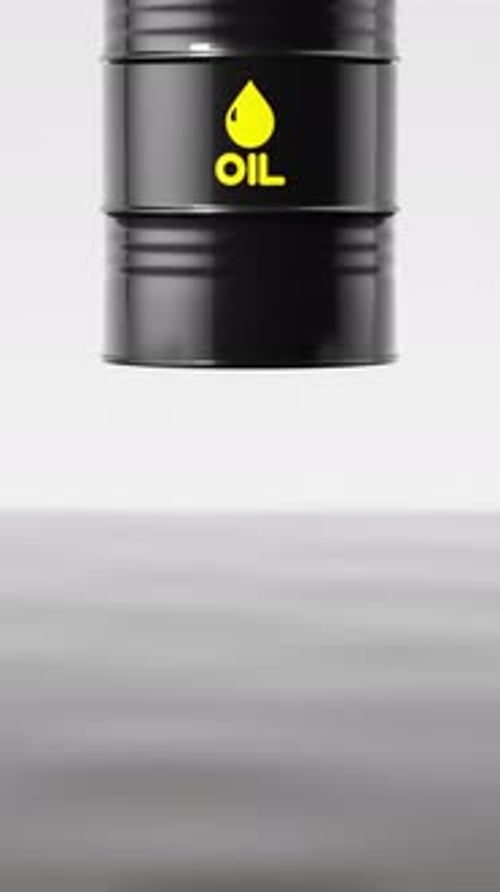 Black Metal Oil Barrel Falling Into a Pond of Crude Oil with a Dramatic Liquid Splash Vertical Video