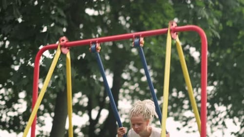 Girl Swinging on Swing in Park Child Having Fun Playing on Outdoor Public Playground Kids Play on