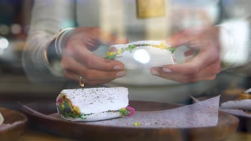 Woman Holding a Delicious Looking Sandwich
