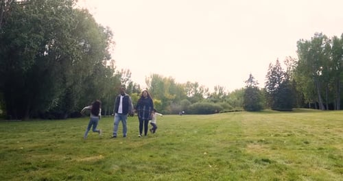 Happy Family Playing and Walking in Autumn Park 3034 Years