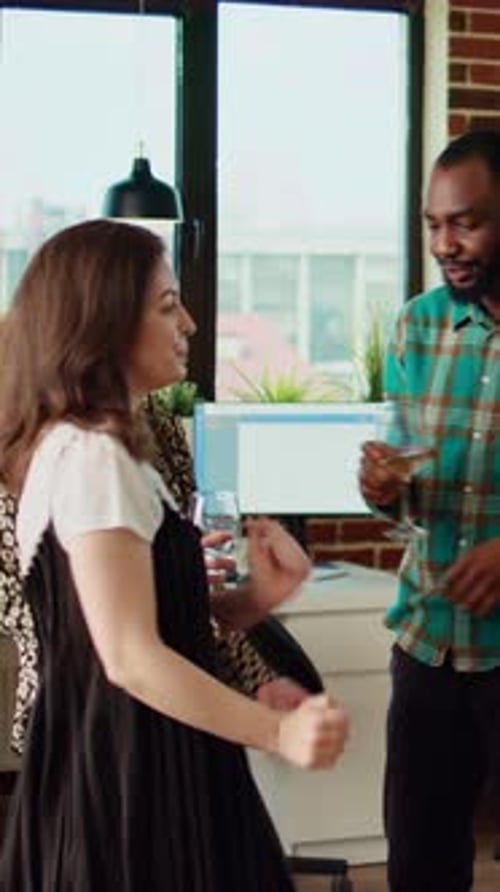 Vertical Video Cheerful Friends Dancing at Apartment Party Having Fun Together Doing Energetic Dance