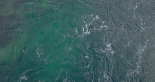 Top Down View Of Swirling Ocean Current In Northern Norway. Aerial Drone Shot