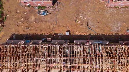 Aerial View of New Home Under Construction With Truss Roof