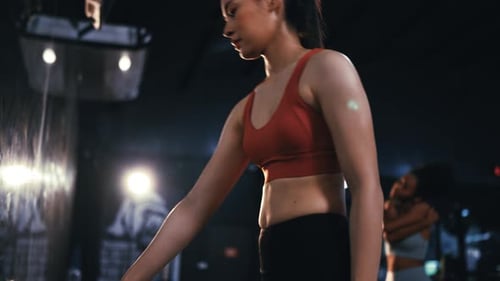 Women sporty workout exercise with dumbbells in the fitness gym