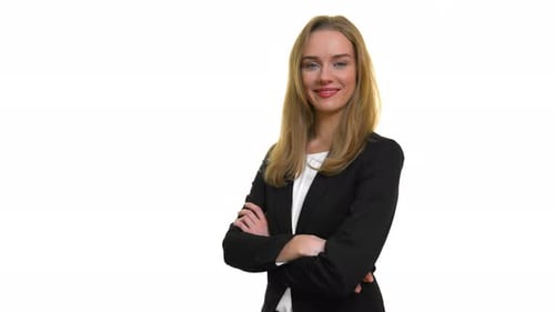 Confident Woman Poses with Arms Crossed, Smiling
