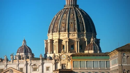 Aerial view of Vatican city from the distance. Saint Peter's Basilica at sunset in Rome, Italy