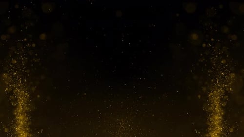 Dos corrientes de partículas de polvo dorado