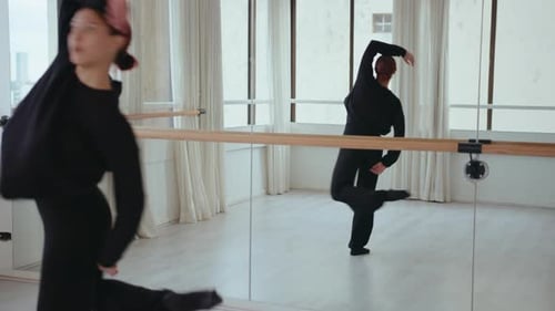 Young Girl Performing Contemporary Dance in Studio