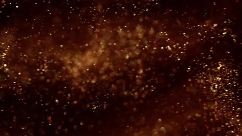Sparkling Golden Bokeh Particles on Dark Background