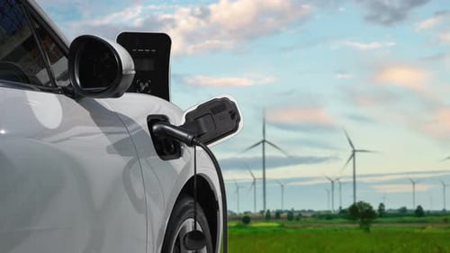 Progressive Electric Vehicle Powered By Clean Energy Generated By Wind Turbine