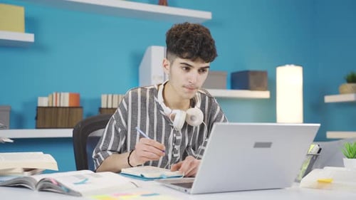 Dedicated Student Engaged in Online Learning at Home