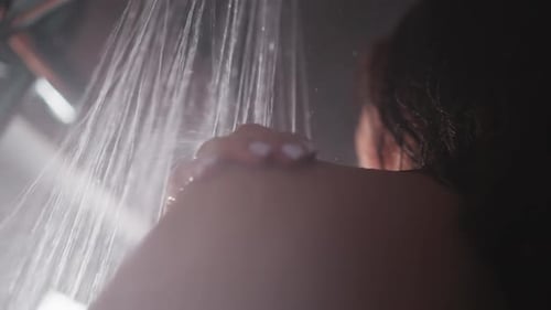 Woman taking a Shower, Back View Close Up
