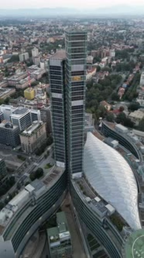 Aerial video above the skyscrapers of Milan city