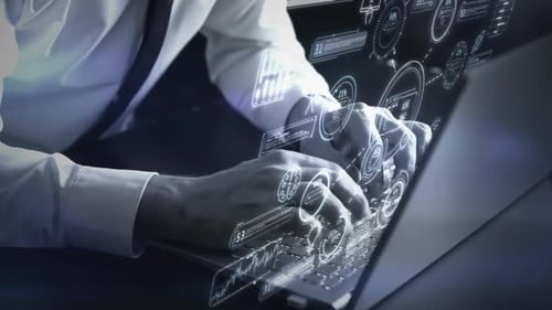 A Man at a Laptop Works with a Code