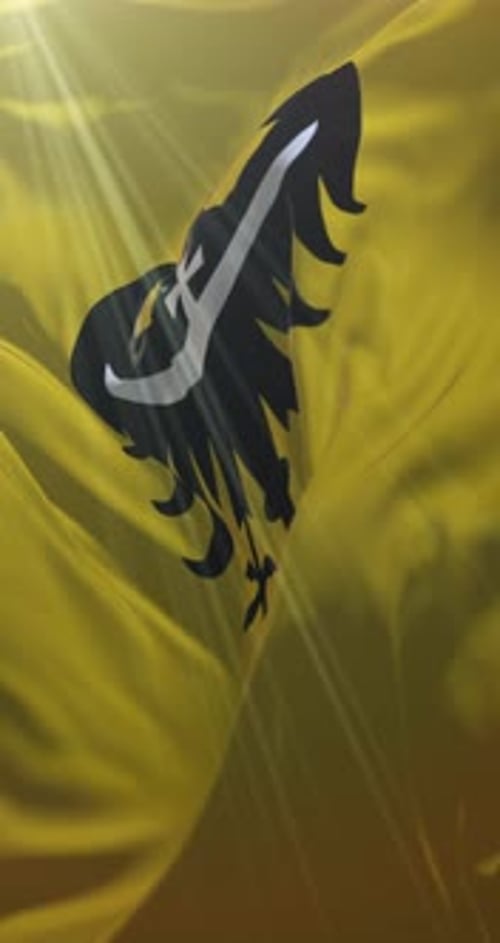 Golden Waving Flag with Black Heraldic Bird Emblem