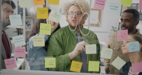 Colleagues Collaborating and Brainstorming on Project