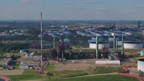 Aerial View of Expansive Industrial Refinery on a Clear Day