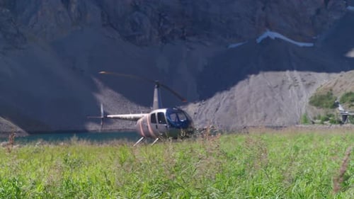 A thrilling helicopter tour of the Canadian Rocky Mountains, breathtaking aerial views of snow-cappe