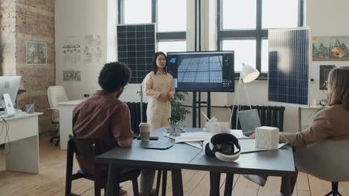 Asian Female Engineer Presenting Solar Energy Project