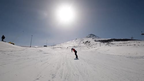 Person Snowboarding On Mountain